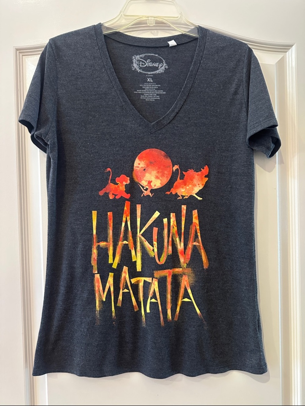 Disney Charcoal V-Neck Tee with Orange-Yellow Hakuna Matata Graphic